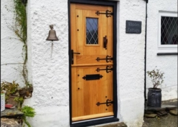 stable-doors-with-lamp-and-bell